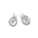 LIVKE’s silver geometric hoop earrings with triple coil layers, styled with a sleek bun for minimalist office elegance.