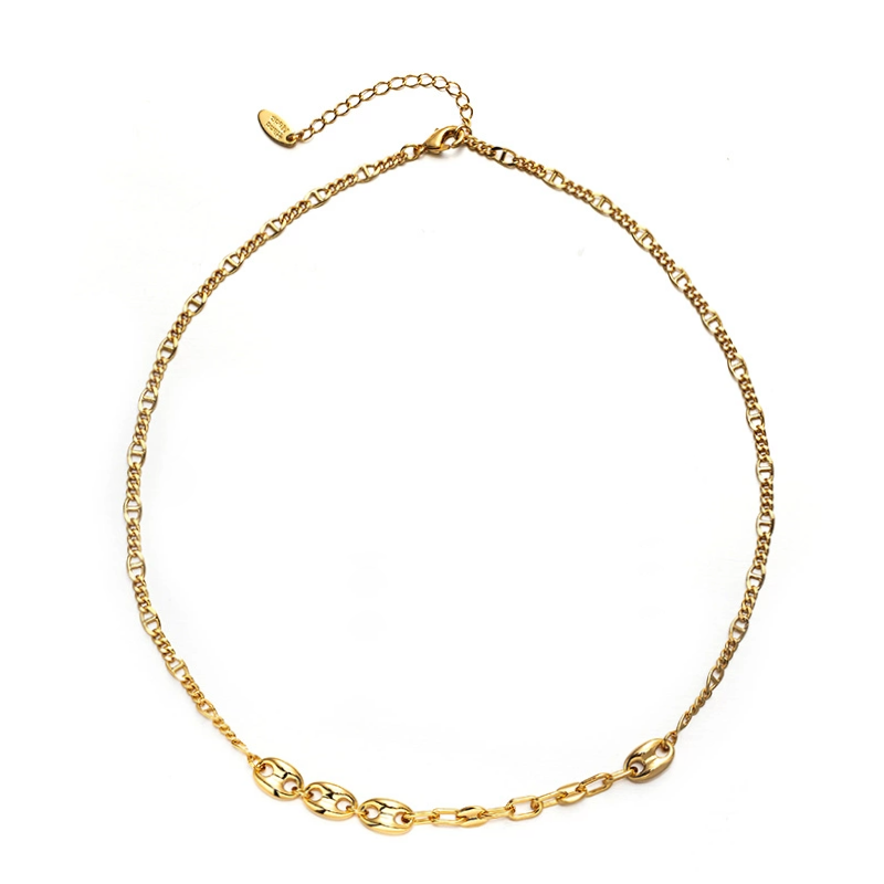 Three LIVKE gold layered necklaces with minimalist pendants, styled over a white tee for casual-chic everyday outfits.