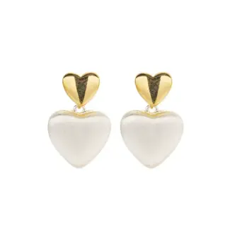 LIVKE’s vintage heart stud earrings with textured gold finish, styled with a denim jacket for casual-chic outfits.