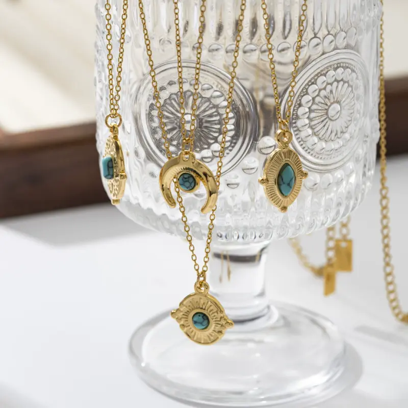 LIVKE’s gold oval bead necklace with intricate vintage texture, styled with a black evening gown for royal-inspired elegance.