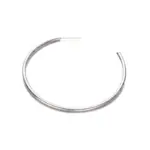 LIVKE’s minimalist sterling silver hoop earrings styled with a white button-up for office-ready elegance.