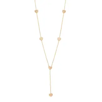 LIVKE’s gold enamel heart pendant necklace styled with a floral dress for Parisian-inspired everyday charm.