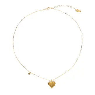 LIVKE’s gold layered heart necklaces styled with a black turtleneck for minimalist everyday elegance.