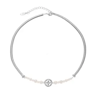 LIVKE’s gold tulip pendant necklace with faux pearl, styled with a trench coat for transitional elegance.