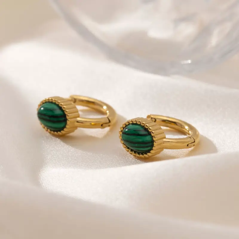 LIVKE’s gold malachite stud earrings styled with a white linen shirt for minimalist office elegance.