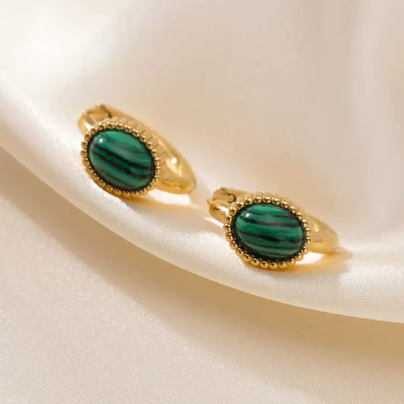LIVKE’s gold malachite stud earrings styled with a white linen shirt for minimalist office elegance.