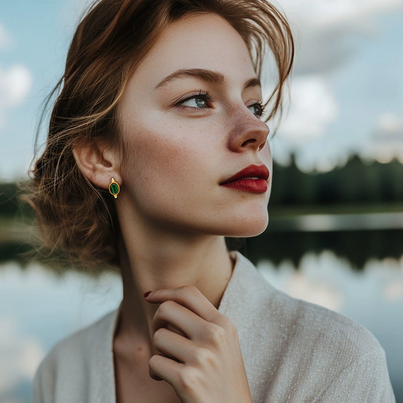 LIVKE’s gold malachite stud earrings styled with a white linen shirt for minimalist office elegance.