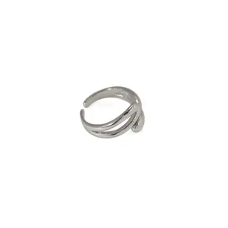Architect wearing LIVKE geometric ring with concrete maquette in Berlin gallery, demonstrating jewelry as micro-architecture