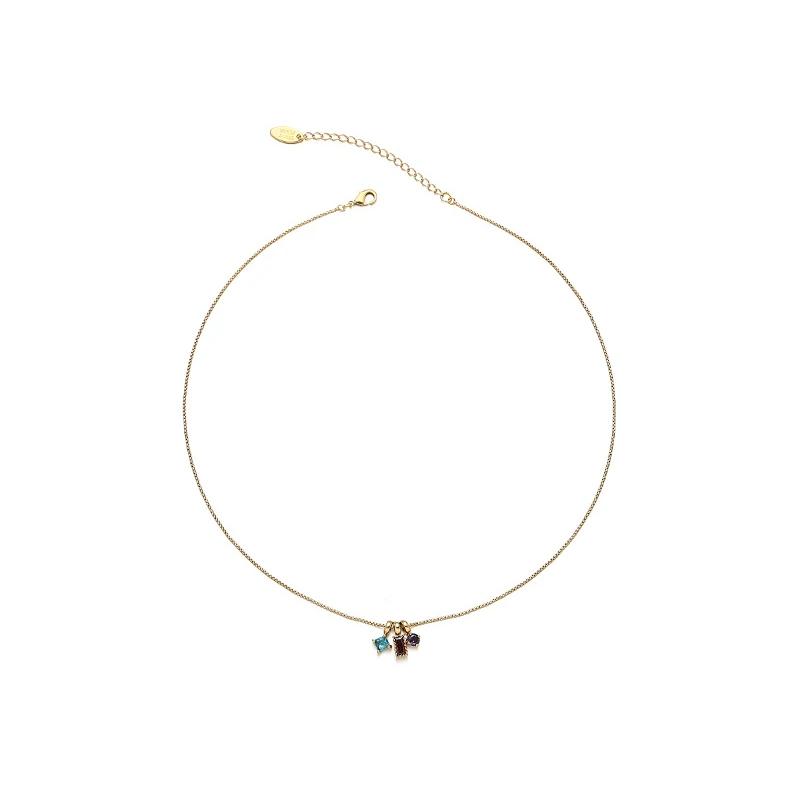 Woman wearing LIVKE multicolor zirconia necklace transitioning from office blazer to cocktail dress, showcasing prismatic jewelry for versatile styling