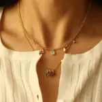 Woman wearing LIVKE multicolor zirconia necklace transitioning from office blazer to cocktail dress, showcasing prismatic jewelry for versatile styling