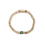 Industrial-style chunky chain bracelet with prism-cut cubic zirconia stones, contrasting raw metal texture with luxurious sparkle for bold jewelry lovers