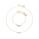 Delicate gold and silver chain set with iridescent shell pendants, perfect for beach weddings and minimalist jewelry lovers