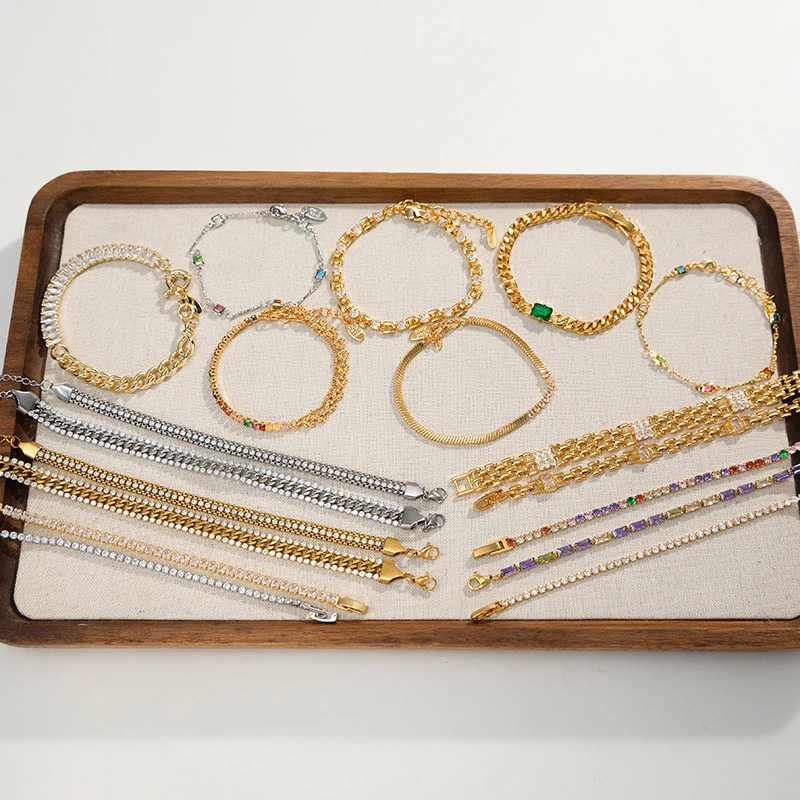 Three-tone zirconia tennis bracelets showcasing gold, silver, and rainbow color options, perfect for jewelry stacking and special occasion gifts