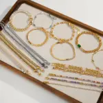 Three-tone zirconia tennis bracelets showcasing gold, silver, and rainbow color options, perfect for jewelry stacking and special occasion gifts