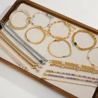 Three-tone zirconia tennis bracelets showcasing gold, silver, and rainbow color options, perfect for jewelry stacking and special occasion gifts
