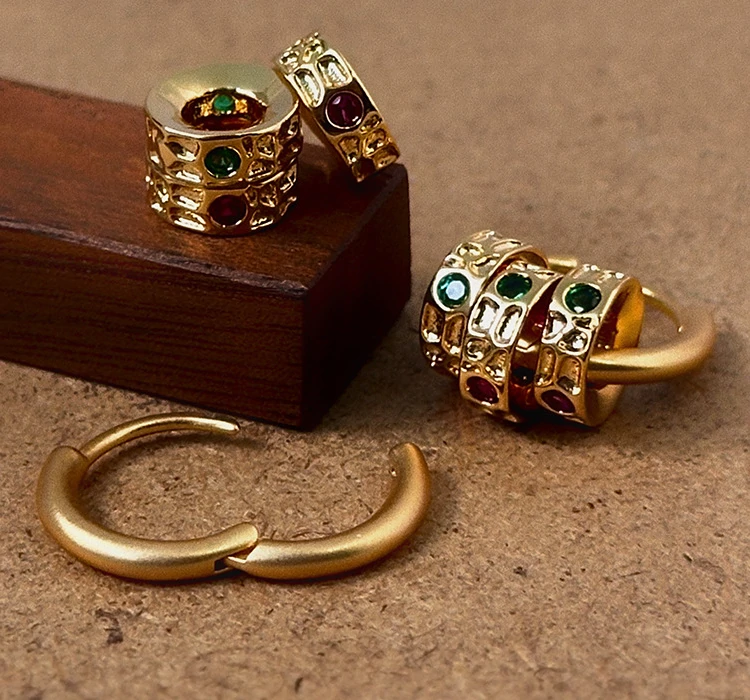 Red and green cubic zirconia tri-ring jewelry set with detachable ear cuffs, perfect for cyberpunk fashion and festival rave accessories