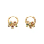 Red and green cubic zirconia tri-ring jewelry set with detachable ear cuffs, perfect for cyberpunk fashion and festival rave accessories
