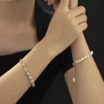 Gray Akoya pearls alternating with rhodium-plated chain links, embodying modern Japandi style for mindfulness jewelry enthusiasts