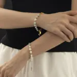 Gray Akoya pearls alternating with rhodium-plated chain links, embodying modern Japandi style for mindfulness jewelry enthusiasts